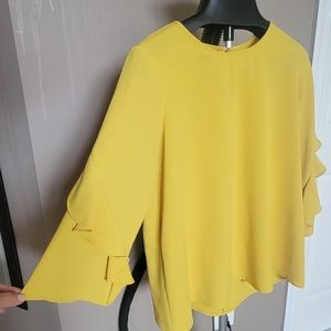 Mustard colored Alfani blouse with ruffled sleeves and zipper back, Size S